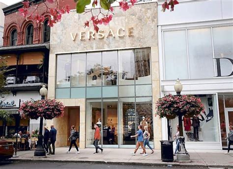 kors e versace m&a report